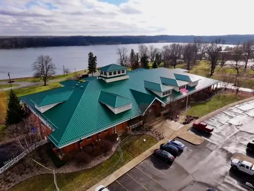 Tarping and dry-in on a Pebble Brook commercial roof